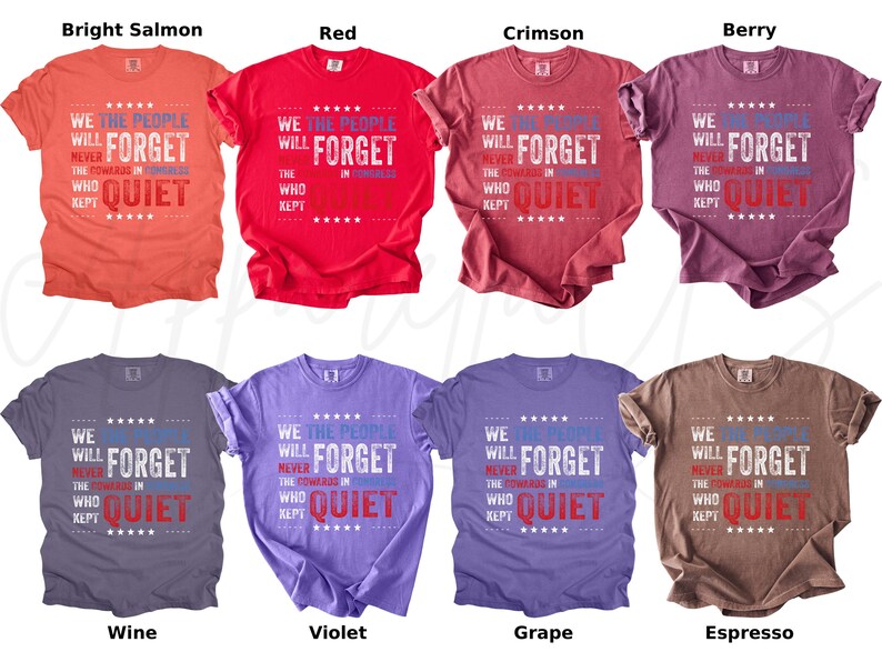 May include: Collection of eight t-shirts in various colors, including bright salmon, red, crimson, berry, wine, violet, grape, and espresso. Each shirt features the text "WE THE PEOPLE WILL NEVER FORGET THE COWARDS IN CONGRESS WHO KEPT QUIET."