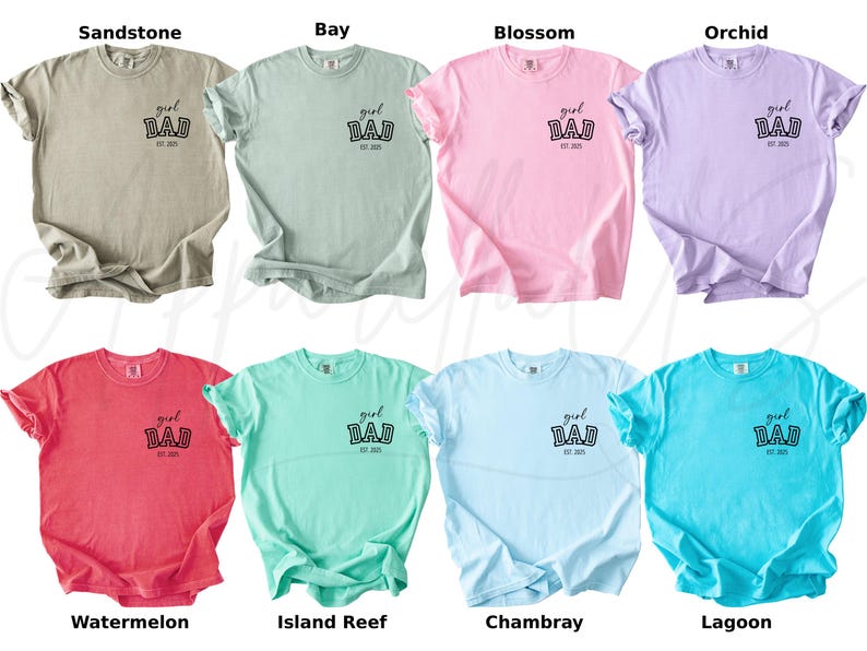 May include: Eight different colored t-shirts are displayed, each with the words "girl DAD est. 2023" printed on the front. The colors include sandstone, bay, blossom, orchid, watermelon, island reef, chambray, and lagoon.