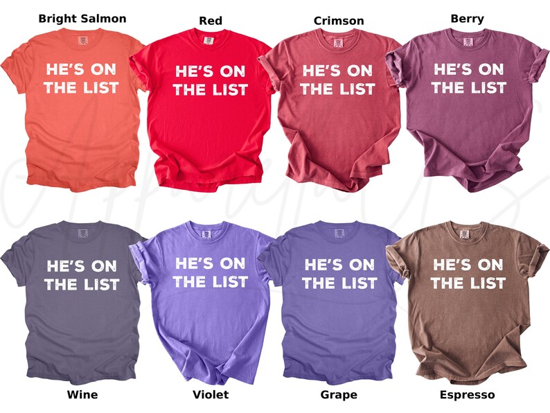 May include: Eight t-shirts in a range of colours: bright salmon, red, crimson, berry, wine, violet, grape, and espresso. Each shirt has the white text "HE'S ON THE LIST".