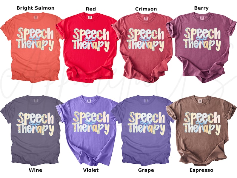 May include: A collection of eight t-shirts in various colors, including bright salmon, red, crimson, berry, wine, violet, grape, and espresso. Each shirt features the words "Speech Therapy" in a decorative font.
