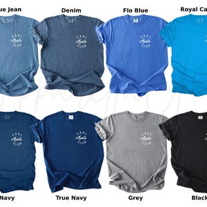 May include: A set of ten t-shirts in various colors, each featuring the text "Cool Aunts Club" in white lettering. The t-shirts are displayed on a white background.