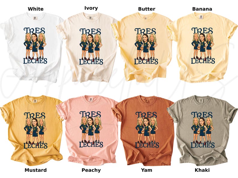 May include: A collection of t-shirts in various colors, including white, ivory, butter, banana, mustard, peachy, yam, and khaki. Each shirt features a graphic of three women and the text "TRES LECHES" in a dark blue color.