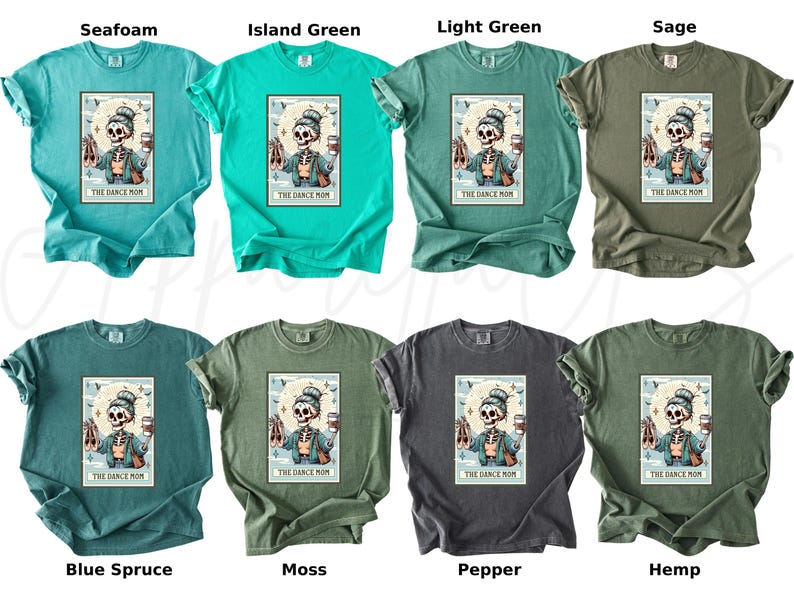 May include: A collection of eight t-shirts in various colors, including seafoam, island green, and sage. Each shirt features a graphic of a skeleton holding ballet shoes and a coffee cup, with the text "THE DANCE MOM".