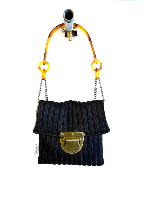 small black bags with handles
