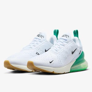 May include: Pair of white athletic shoes with green and tan accents. The shoes feature a mesh upper, black swoosh logos, and the number "270" printed on the side. The soles are tan and the air bubble is green.