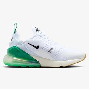 May include: White and green athletic shoe with a black Nike swoosh. The shoe features a white mesh upper, a green heel counter, and a visible air unit. The sole is a combination of white, green, and tan.