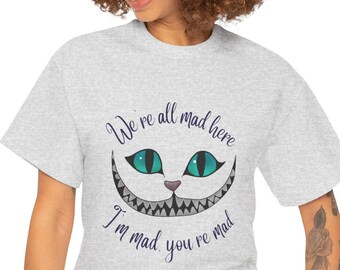 チェシャ猫のTシャツ：「私たちはみんな狂っている」不思議の国のアリスTシャツ
