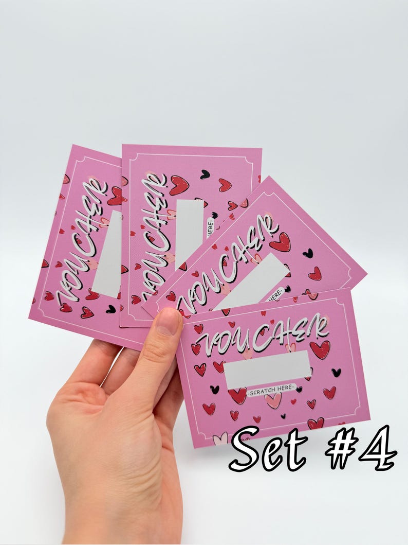 May include: Set of four pink scratch-off cards with a heart pattern and the text "You Cash" printed on each card. The cards are labeled "Set #4".