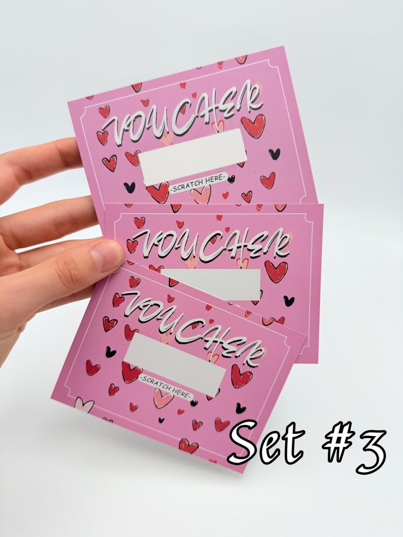 May include: Set of three pink scratch-off vouchers with a heart pattern and the word "VOUCHER" written in white. The text "SCRATCH HERE" is printed on each voucher. The text "Set #3" is printed below the vouchers.