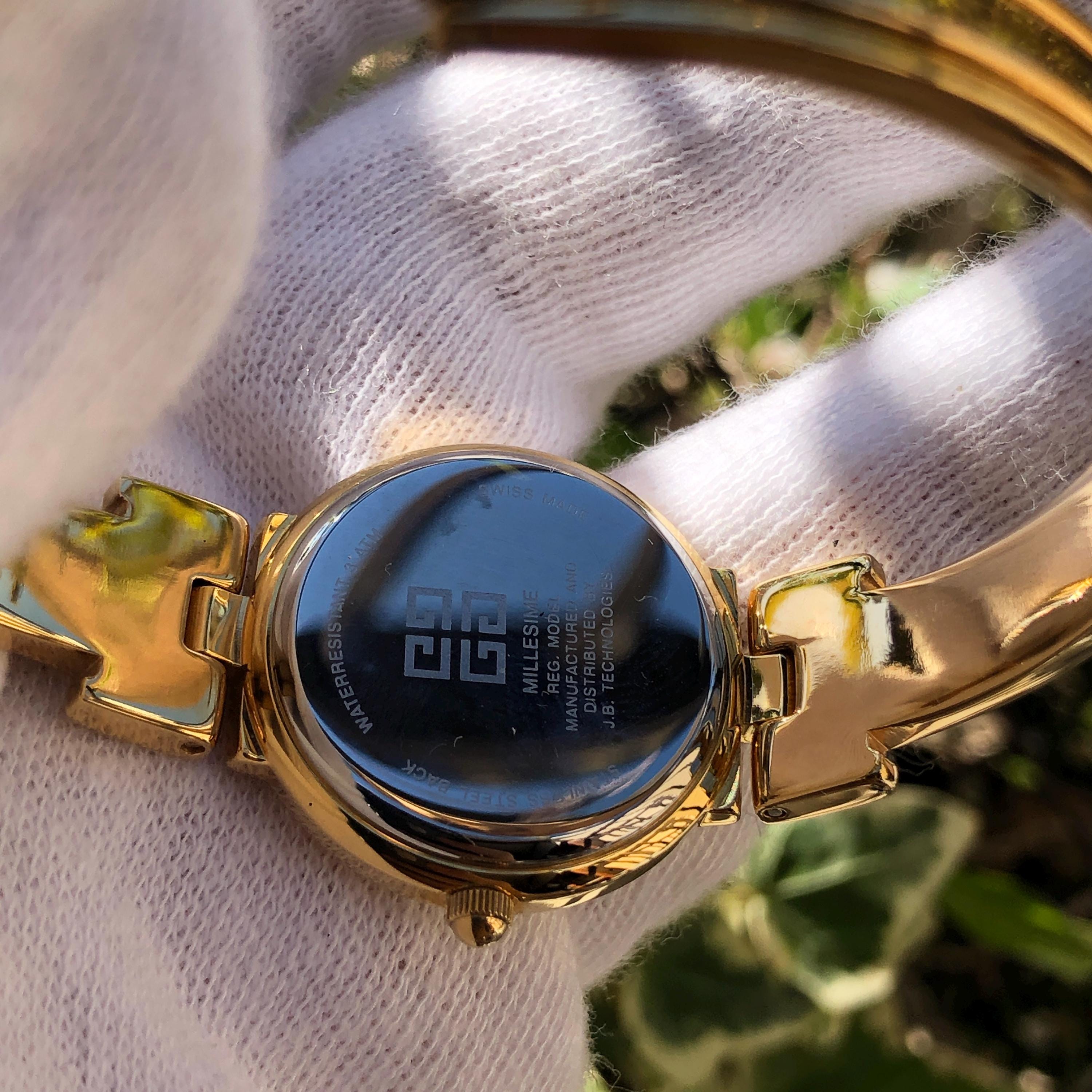 Vintage GIVENCHY Millesime Bangle Watch: Black Dial, Gold Plated