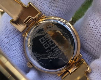希少なヴィンテージ ジバンシィ バングルウォッチ：ミレジムブルー文字