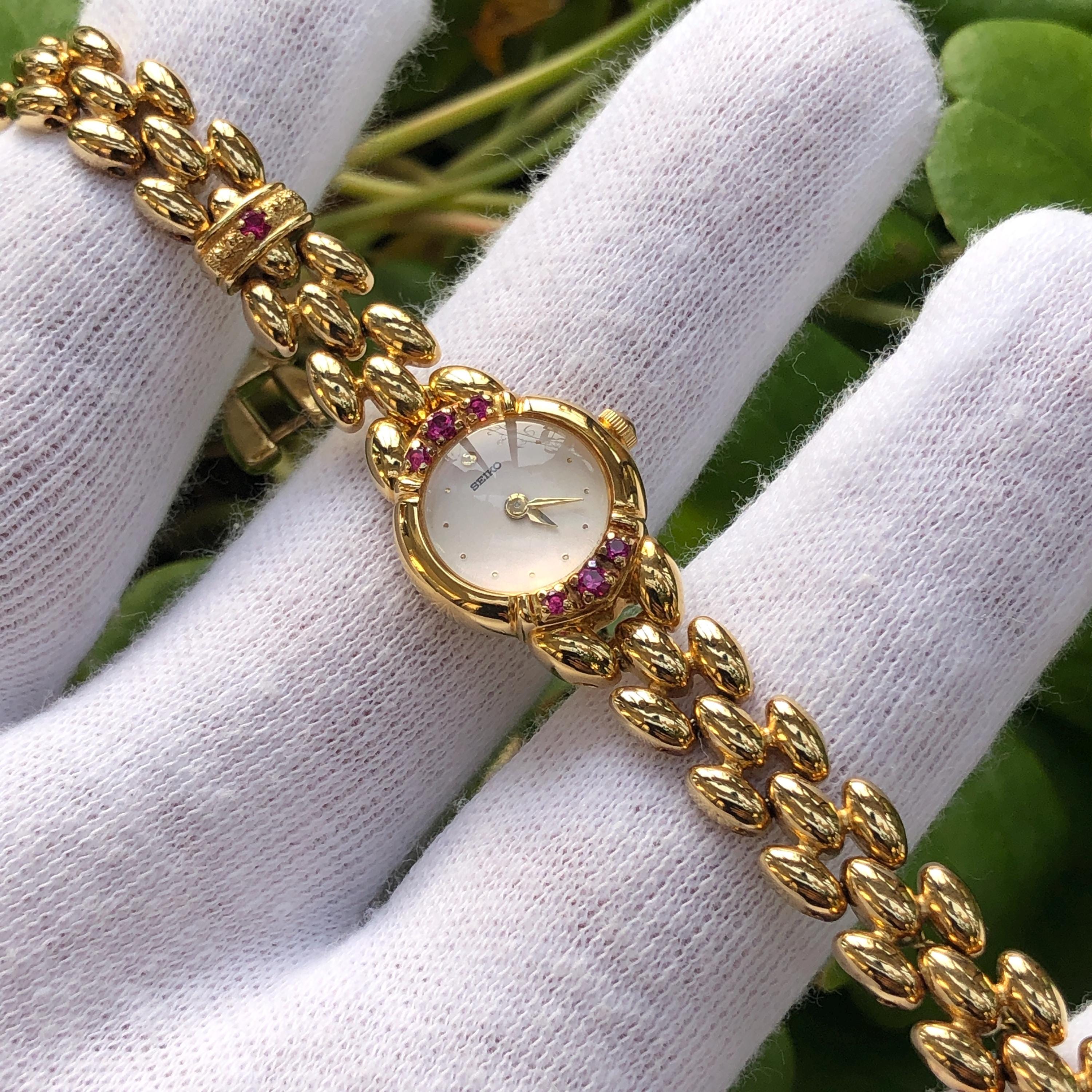 AUTHENTIC VINTAGE SEIKO RUBY DAINTY WATCH il_fullxfull.6830671700_pxwd.jpg main image 4