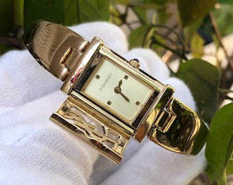 RESERVED Rare  Vintage YSL Yves Saint Laurent PEEKABO hidden dial gold-toned bangle watch 16-16.5cm wrist Good Condition