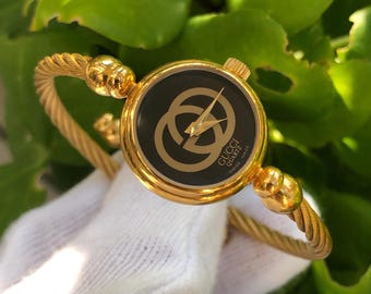 GUCCIグッチ レディース　ワイヤーバングルウォッチ2047.1L VINTAGE GUCCI 2047 Series Flexible Twisted Bangle Type Gold Plated