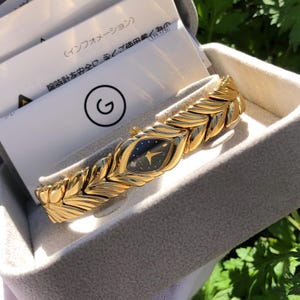RARE Vintage GRES 1P diamond Unique face Black dial gold toned base metal ladys Diamond watch Box papers