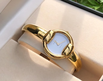 VINTAGE GUCCI 1400L gold plated bangle type lady’s horsebit watch white dial 16-17cm wrist Boxed Good Condition