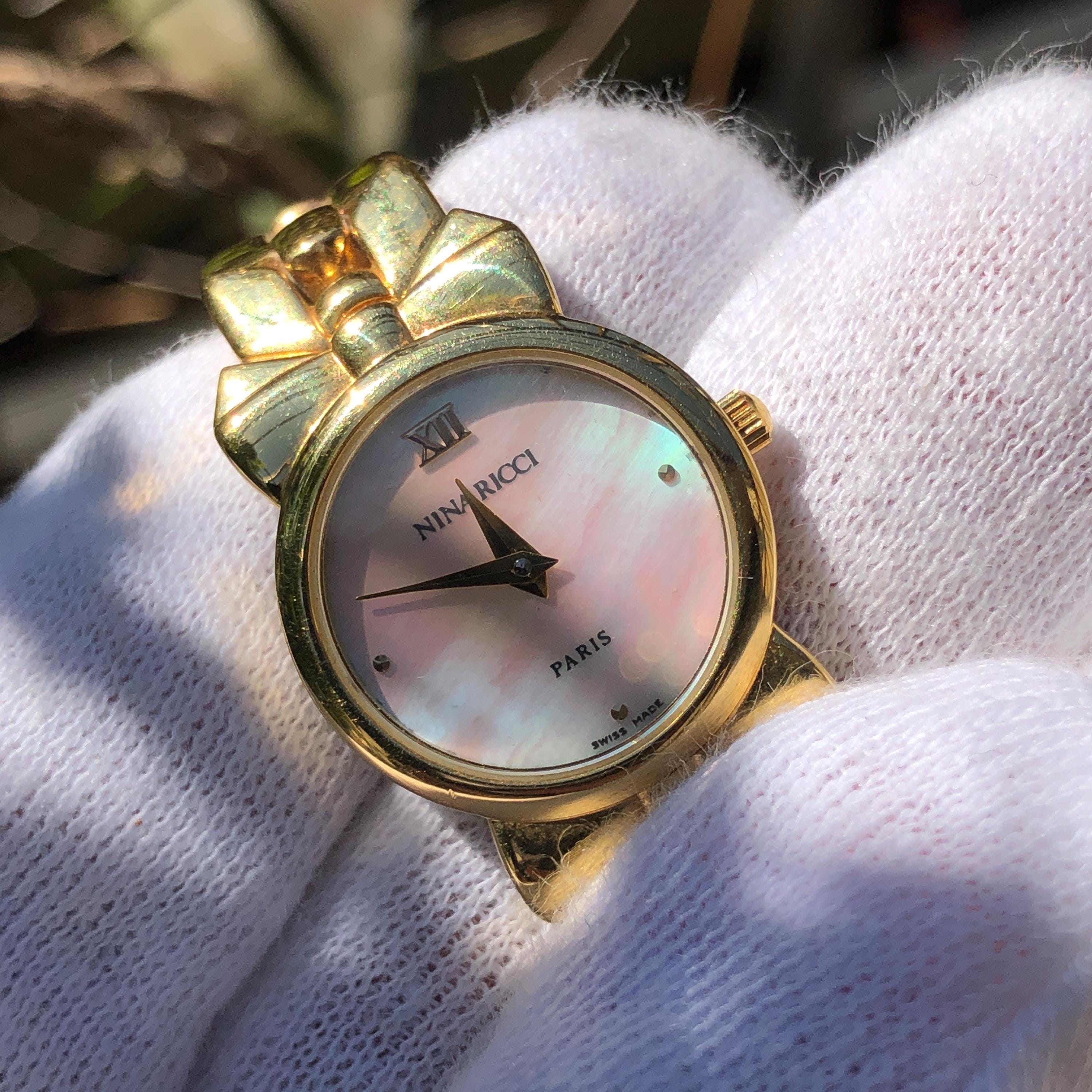 Nina Ricci Gold and Silver Crystal Accent Mother-of-Pearl Dial Watch VINTAGE NINA RICCI MOTHER-OF-PEARL TWO-TONED WATCH – Panahon  main image 2