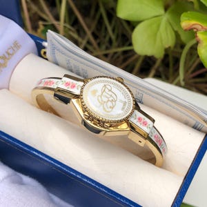 Vintage Andre Mouche Enamel Bangle Watch: Swiss Made Peekaboo Design