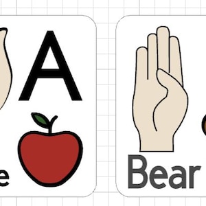 May include: Two white rectangular educational cards featuring American Sign Language hand signs for the letters A and B. The first card displays the letter A, a red apple, and the word Apple. The second card shows the letter B, a brown bear face, and the word Bear.