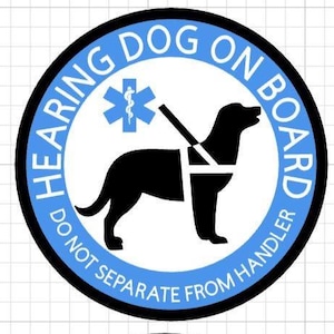 May include: A round sticker with a blue border and white interior. The text "HEARING DOG ON BOARD" and "DO NOT SEPARATE FROM HANDLER" are in white. A black silhouette of a dog wearing a harness is in the center, with a blue medical symbol.