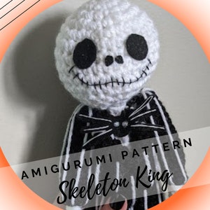 May include: Crocheted amigurumi pattern for a Jack Skellington doll. The doll is white with black eyes and a black and white striped suit. The text "Amigurumi Pattern Skeleton King" is visible in the image.