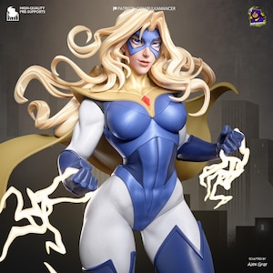 May include: A superheroine figurine with long blonde hair, a blue mask, and a blue and white bodysuit. The figurine is holding stylized lightning bolts. The figure has a gold cape and collar. The text "HIGH-QUALITY PRE-SUPPORTS" is visible.