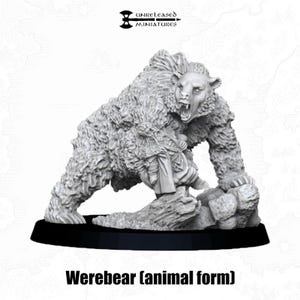 May include: An unpainted miniature of a Werebear in animal form, with an open mouth and a menacing pose. The figure is on a rocky base with a black platform. The text "UNRELEASED MINIATURES" and "Werebear (animal form)" are visible.