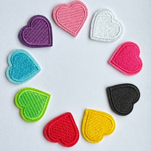 Iron on Patches. 23 mm Heart Shaped Iron On/Sew On Patches - Many Colours to Choose From. Choose a single heart or a mixed pack of 5 or 10.
