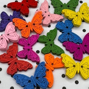 Rainbow Wooden Butterfly Sewing Buttons. 24 mm brightly coloured sewing buttons. Natural wood, nature craft and sewing projects.
