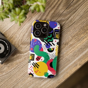 レトロメンフィス風スマホケース、カラフルな80年代風幾何学模様のiPhoneカバー、抽象ポップアート風の美しいTPUケース（iPhone 15 14 13 12 SE用）
