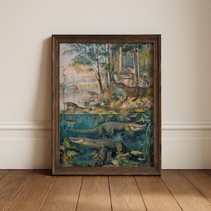 May include: A framed vintage print depicting a swamp scene with alligators, fish, and other wildlife. The artwork features a detailed illustration of a forest and water environment, with a brown wooden frame.