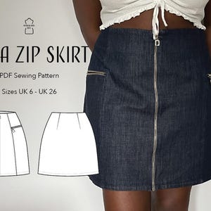 Könnte beinhalten: Dunkelblaue Jeansrock mit silbernem Reißverschluss und zwei Vordertaschen. Der Rock ist Teil eines PDF-Schnittmusters namens "Zara Zip Skirt", erhältlich in den UK-Größen 6-26. Das Bild enthält auch eine Strichzeichnung des Rocks.