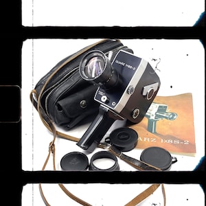 Super 8 camera test and working Zenit Quarz 1x8S-2 8mm film camera + original leather bag + handle + filters + manual + film tested