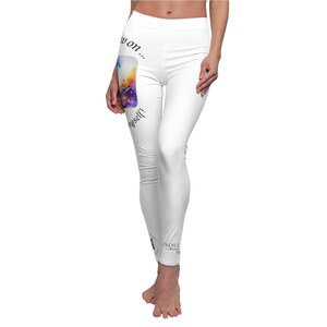 May include: White leggings with a colorful graphic print and the text "Show on... yourself!" on the left leg. The leggings have a black logo on the right leg.