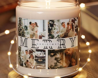 May include: A white candle with a clear glass jar and a label that says "Merry Christmas" with four photos of a family in a collage. The candle is sitting on a wooden surface with white string lights around it.