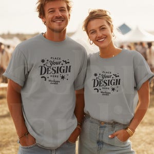 Grey Comfort Colors 1717 T-Shirt Mockup | Unisex Couple Front View | Outdoor Festival Couple Scene Lifestyle Apparel Mock | Matching Outfits