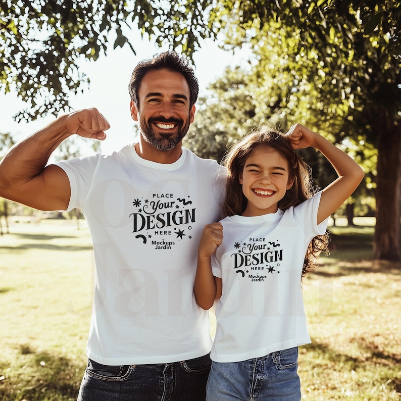 Father and daughter posing outdoors in a sunlit park, both wearing plain white Bella Canvas 3001 T-shirts. The father flexes his arm with a broad smile, while the daughter mirrors his pose, radiating happiness. Lush green trees and warm sunlight create a natural, vibrant background, making this mockup perfect for showcasing custom T-shirt designs. Ideal for Print on Demand, Etsy, and Shopify sellers looking for a cheerful, family-oriented promotional image.