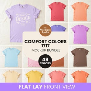 May include: A collection of Comfort Colors 1717 t-shirts displayed in a flat lay front view. The shirts are shown in various solid colors including lavender, red, orange, purple, light blue, brown, yellow, and pink, featuring a central text overlay.