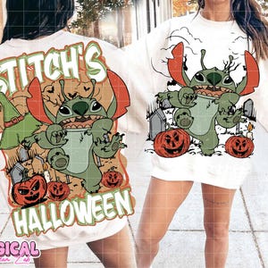 May include: White sweatshirt featuring a Halloween-themed Stitch graphic. The design includes Stitch, pumpkins, tombstones, and the text "Stitch's Halloween". The sweatshirt has a crew neck and long sleeves, perfect for the spooky season.