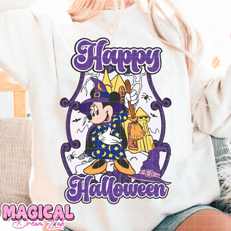 May include: White sweatshirt with a purple and black Halloween graphic. The graphic features Mickey Mouse dressed as a wizard with a broom, the words "Happy Halloween," and a castle. The text "Magical Dream Lab" is at the bottom.