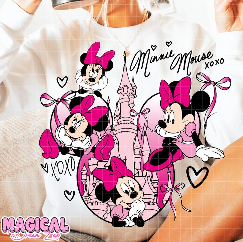 May include: White sweatshirt featuring a Minnie Mouse graphic in pink and black. The design includes Minnie Mouse characters, a castle, hearts, and the text "Minnie Mouse XOXO". The bottom left corner has the text "MAGICAL DREAM LAB".