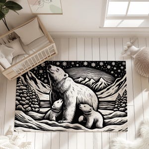 May include: Black and white area rug featuring a polar bear with two cubs, set against a snowy mountain landscape. The design includes snowflakes and pine trees, creating a winter scene. The rug is suitable for a nursery or living room.