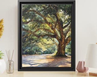 May include: A framed wall art print featuring a watercolor painting of a large, sprawling oak tree with thick, textured branches and dense green foliage, casting dappled shadows across a sunlit ground in a natural outdoor forest setting.