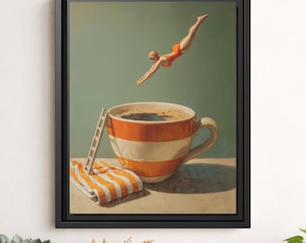 May include: A framed art print depicts a surreal scene of a swimmer diving into a coffee cup. The cup is orange and white striped, with a small ladder and towel. The swimmer wears an orange swimsuit and cap.