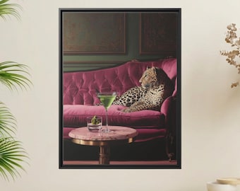 May include: A framed wall art print featuring a leopard resting on a tufted magenta velvet sofa. In the foreground, a round marble-topped table holds a martini glass filled with a green liquid and a small glass containing green olives.