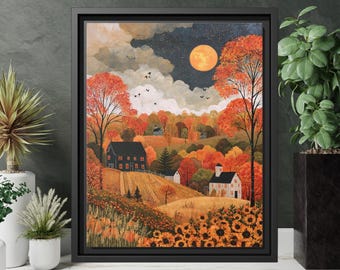 May include: A framed wall art print depicting a rural autumn landscape with a large orange full moon in a dark starry sky. The scene features rolling hills, orange and yellow trees, two houses, and a foreground filled with blooming sunflowers.