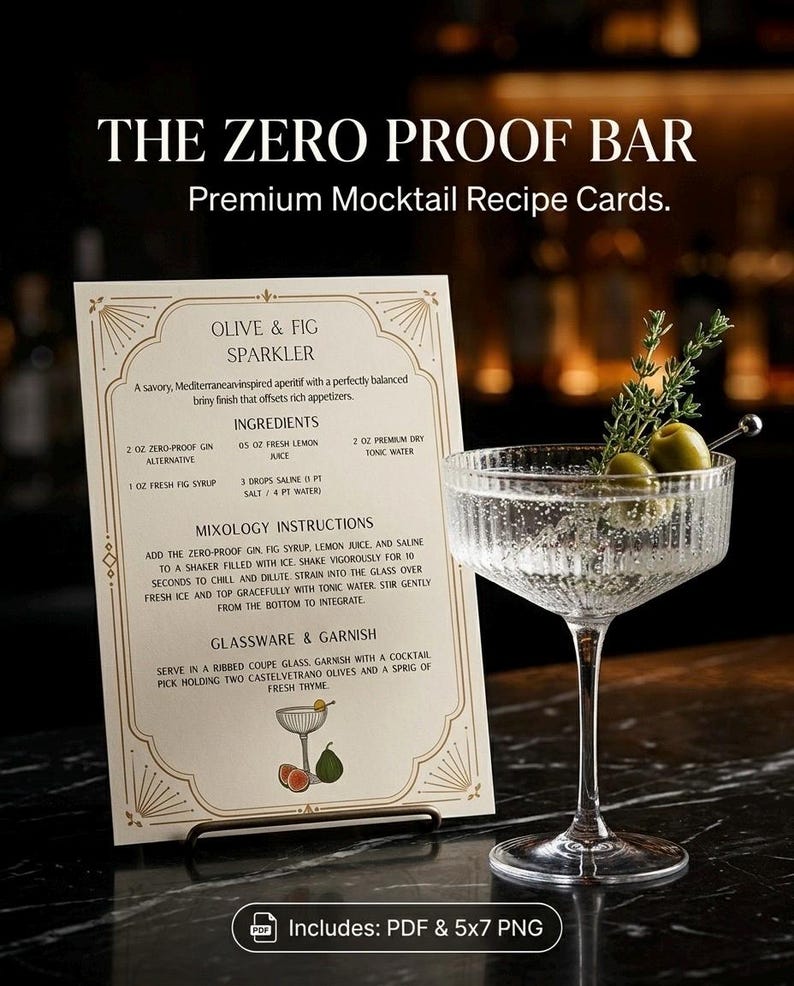 May include: A recipe card for an Olive & Fig Sparkler mocktail, with a cocktail glass garnished with olives and thyme. The card reads "The Zero Proof Bar" and includes ingredients and instructions for the drink.