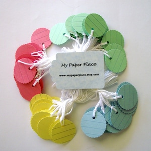 100 -  1 inch Round  Prestrung Cardstock Tags  - Free Secondary Shipping