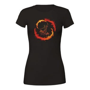May include: Black t-shirt featuring a vibrant graphic of a person dancing within a fiery, circular design. The artwork uses shades of red, orange, and yellow, creating a dynamic and energetic visual. The t-shirt is a classic crew neck style.