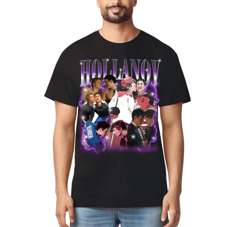 May include: Black t-shirt with a purple graphic design featuring the word "HOLLANOV" and multiple images of young men. The design includes images of men in hockey gear and formal wear.